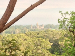 View of Angkor Wat from the base of the sunset ruins.