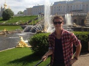 In front of the main fountain in the Peterhof Palace grounds.
