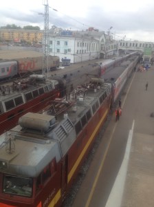 Train as seen from a platform bridge.