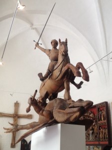 Wooden statue of St George slaying the dragon of legend.