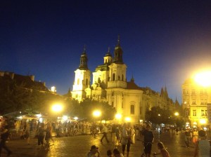St Nicholas Church, eerily illuminated by the lights of Old Town Square. 