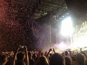 Confetti falling as the band plays their final song. 
