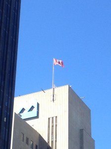 The Canadian flag flying high in Montreal.
