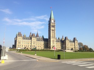 The Centre Block and the Peace Tower of Parliament Hill, with the maple leaf proudly blowing in the wind. 