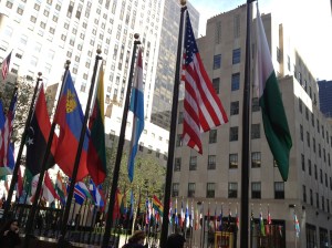 Flags around the ice rink in front of the Rockefeller Center.