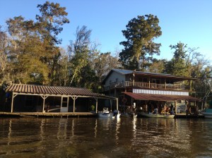 Swamp houses on the water, in the middle of nowhere.