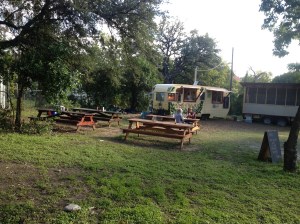Benches and tables set up around the food trucks, which makes me fairly certain these trucks hardly ever actually drove anywhere.